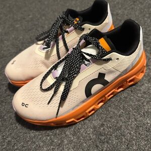 On cloud orange Monster tennis shoe